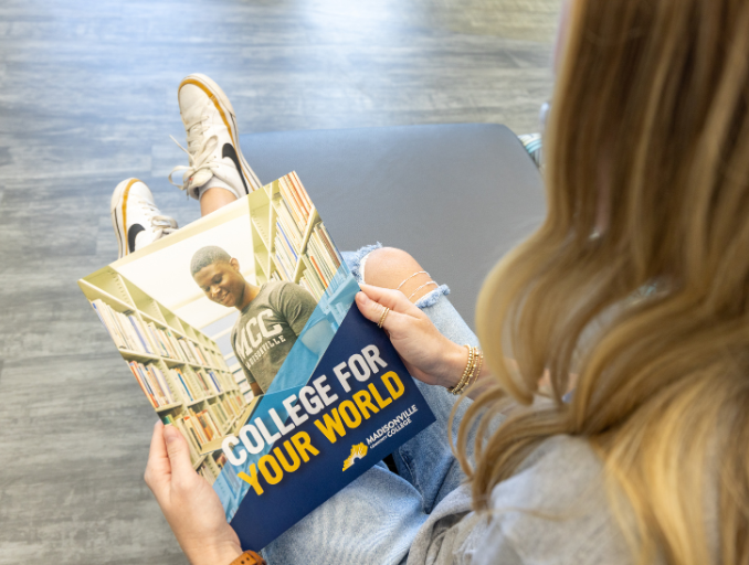 girl holding folder