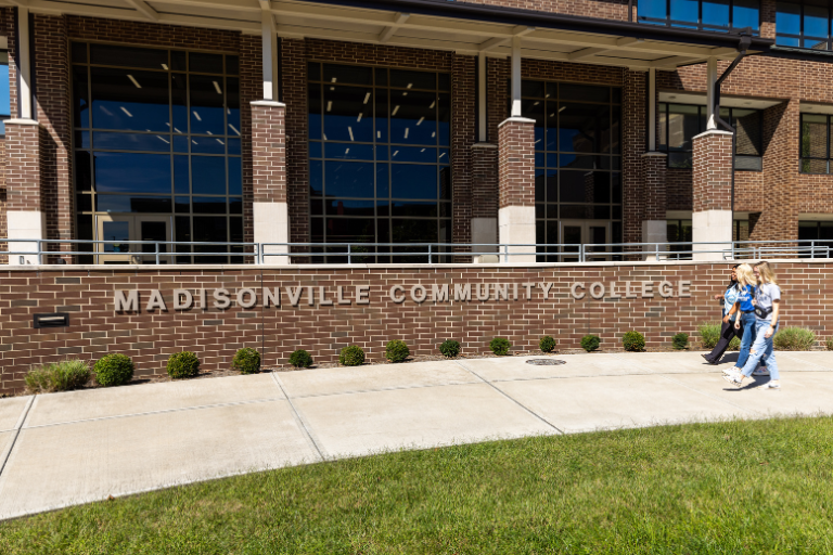 students walking on sidewalk