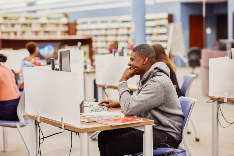 student working on a computer