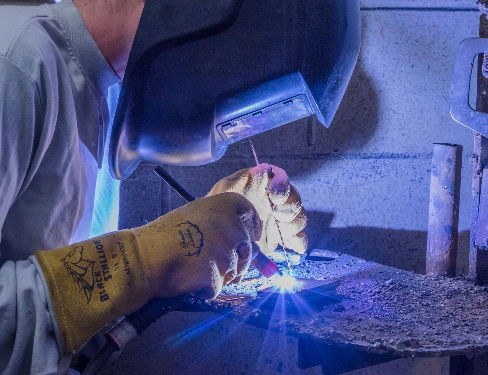 Student practicing welding. 