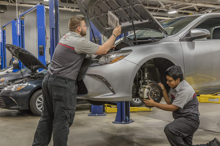 Students Working on Car